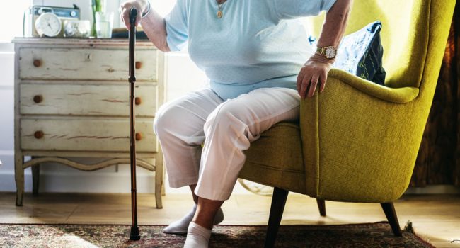 Senior woman sitting on the chair